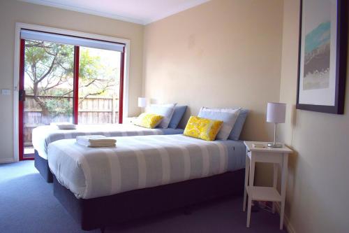 Ένα ή περισσότερα κρεβάτια σε δωμάτιο στο Chapel Street Lighthouse