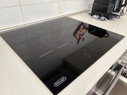 Η κουζίνα ή μικρή κουζίνα στο Apartment Malpensa