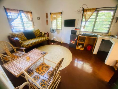 an overhead view of a living room with a table and chairs at Mkayamba House in Malindi