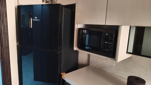 Η κουζίνα ή μικρή κουζίνα στο Cozy stay near Riphah International University