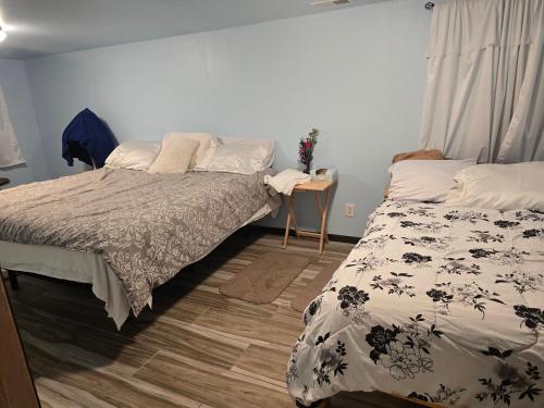 Ένα ή περισσότερα κρεβάτια σε δωμάτιο στο Spacious and Cozy 4-Bedroom Home in the heart of MSP