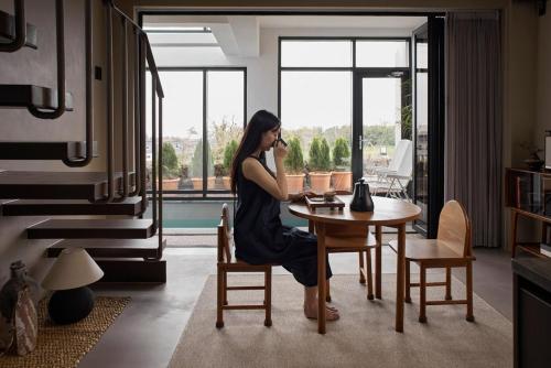 Χώρος καθιστικού στο Jeju Rapauza Stay