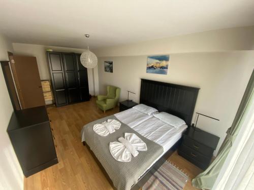 Una cama o camas en una habitación de Apartments 315 New Gudauri 2 blok