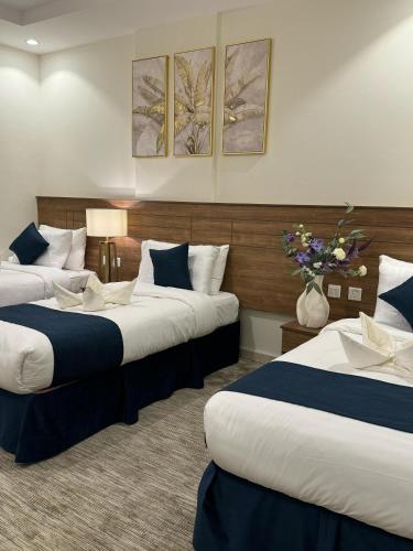 Ένα ή περισσότερα κρεβάτια σε δωμάτιο στο Oriens Shishah