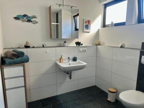 Ένα μπάνιο στο Ferienwohnung GoJa 2