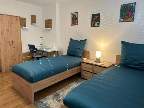 Ένα ή περισσότερα κρεβάτια σε δωμάτιο στο Ferienwohnung GoJa 2