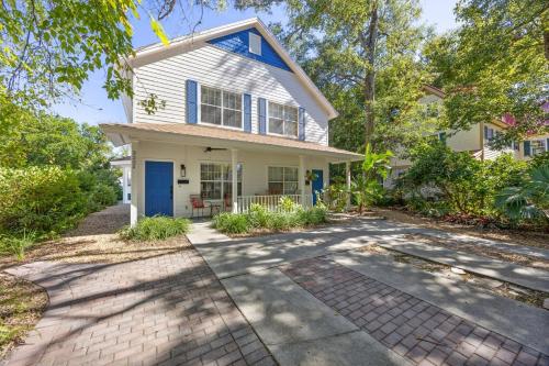 a house with a blue door and a driveway at 322 S, 5th Street Unit A townhouse in Fernandina Beach
