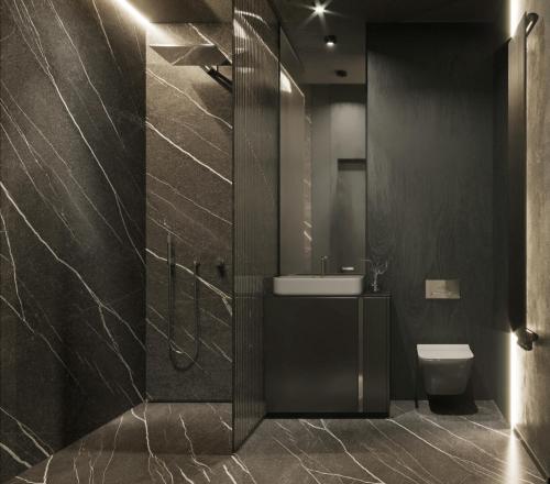 ein Badezimmer mit Dusche, Waschbecken und Toilette in der Unterkunft West Baltic City in Stettin