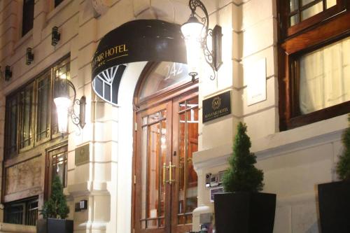 a store front of a building with a door at The Mayfair Hotel Times Square, an Ascend Collection in New York
