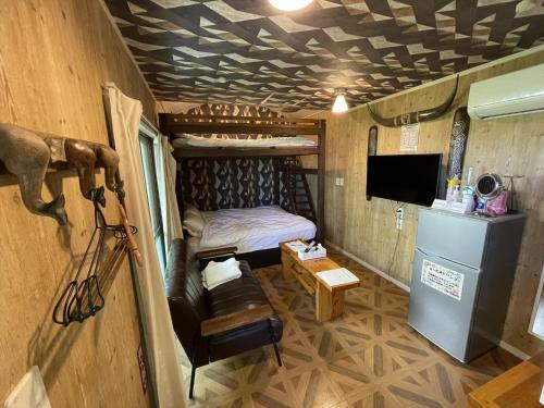 Postel nebo postele na pokoji v ubytování Shiawaseninaru Kourijima no Yado