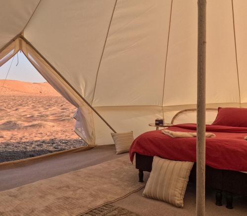 Una cama o camas en una habitación de ShootingStar Private Camp