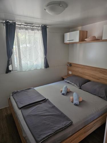 Postel nebo postele na pokoji v ubytování Vila Matias