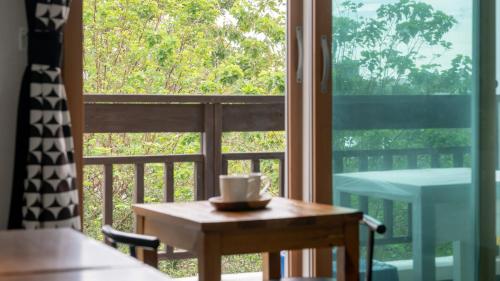 En balkon eller terrasse på Gangneung Undukmaru Pension