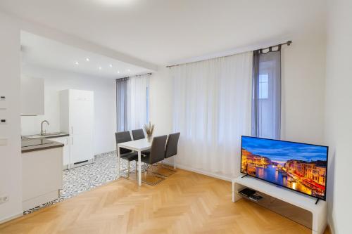 TV a/nebo společenská místnost v ubytování Home Sweet Home - Stephansdom