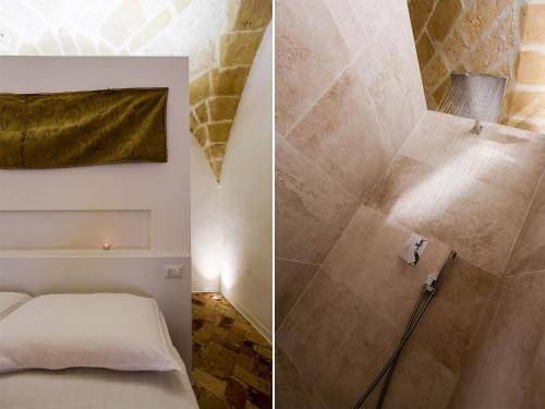 a bedroom with a shower and a bed in a room at La casa del nonno in Matera