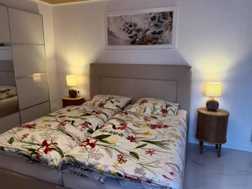 Postel nebo postele na pokoji v ubytování Ferienwohnung im Kannenbäckerland