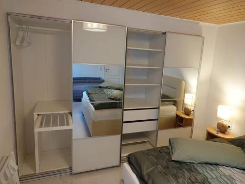 Postel nebo postele na pokoji v ubytování Ferienwohnung im Kannenbäckerland