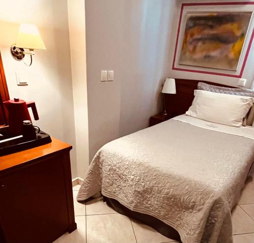 Posteľ alebo postele v izbe v ubytovaní Triton Hotel Piraeus