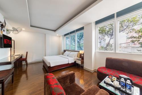 Ένα ή περισσότερα κρεβάτια σε δωμάτιο στο A25 Hotel - 20 Bùi Thị Xuân