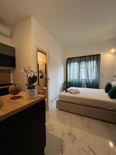 Domus Jota - Comfort e Stile in Suite Indipendente