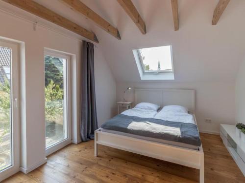 Postel nebo postele na pokoji v ubytování Brunnenhaus Land-Idylle in der Stadt