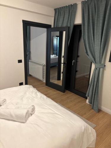 Postel nebo postele na pokoji v ubytování Chalet Amurg Arinis Gura Humorului