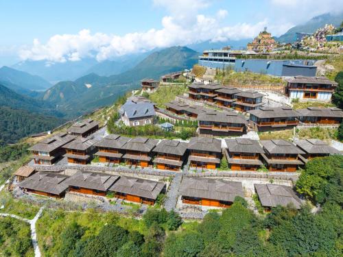 an aerial view of a village on a mountain at Heaven Gate O Quy Ho Sapa-Free Entry & Himalaya Salt Sauna in Lao Cai