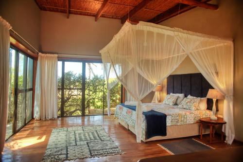 Llit o llits en una habitació de Tree House Villa