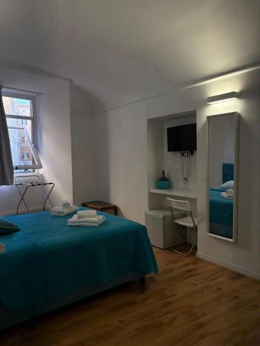 Ένα ή περισσότερα κρεβάτια σε δωμάτιο στο AH Suite Montecitorio