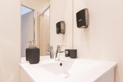 TV a/nebo společenská místnost v ubytování Syrah