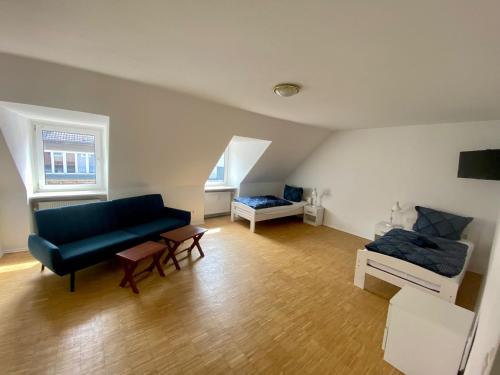 TV a/nebo společenská místnost v ubytování Kiel, Holstenstraße 5 Og Rechts