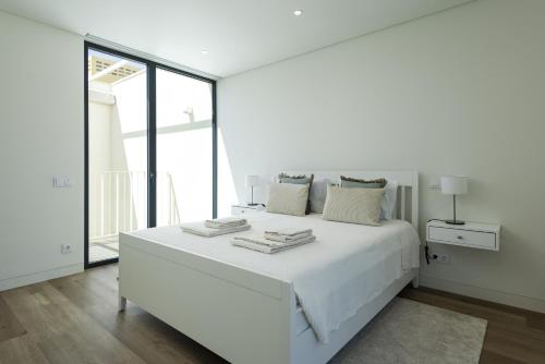 En eller flere senge i et værelse på Vilamoura Parque - Luxury Villa with pool by HD