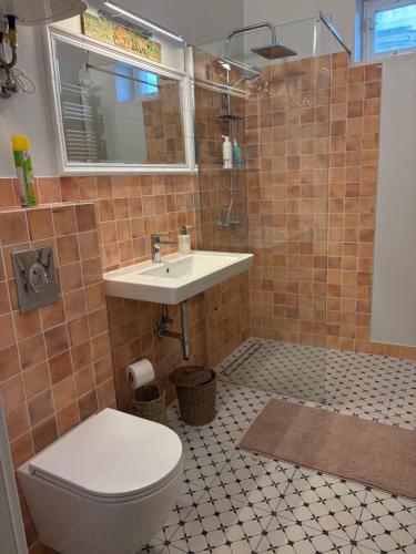 Koupelna v ubytování Apartament przy księgarni