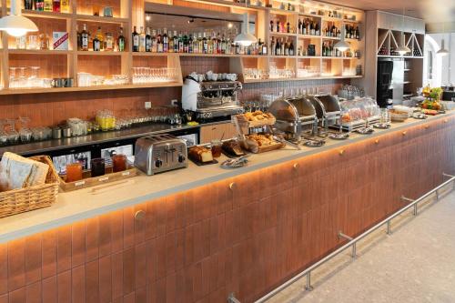 Gambar di galeri bagi BABEL COMMUNITY Hôtel Saint-Quentin-en-Yvelines di Montigny-le-Bretonneux