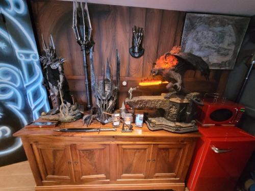 a wooden table with a bunch of items on it at La Comté à Blagnac in Blagnac