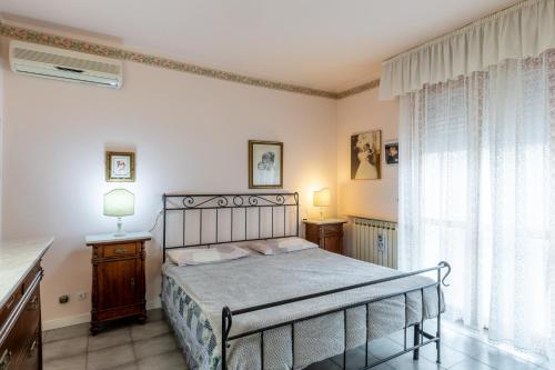 Postel nebo postele na pokoji v ubytování Villetta Girasole