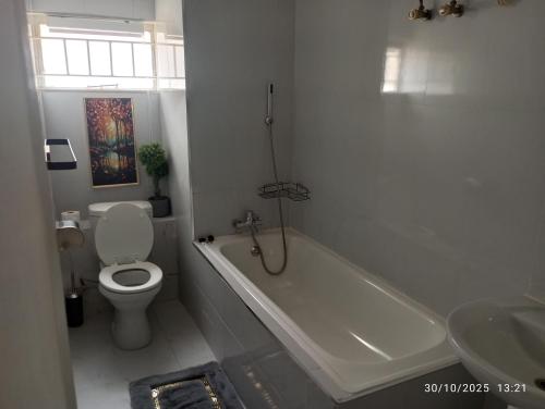 Et badeværelse på B01 Laxia Apartment