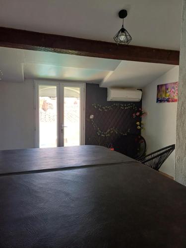 Postel nebo postele na pokoji v ubytování Maison avec jacuzzi