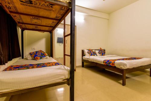 Postel nebo postele na pokoji v ubytování RBR Beach Resort-TBV