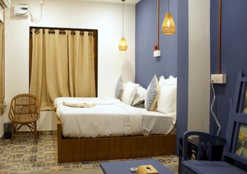 Ένα ή περισσότερα κρεβάτια σε δωμάτιο στο EKAM