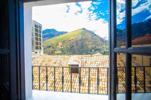 a view of a mountain from a window at Apartamento con vistas a la montaña en Cazorla in Cazorla
