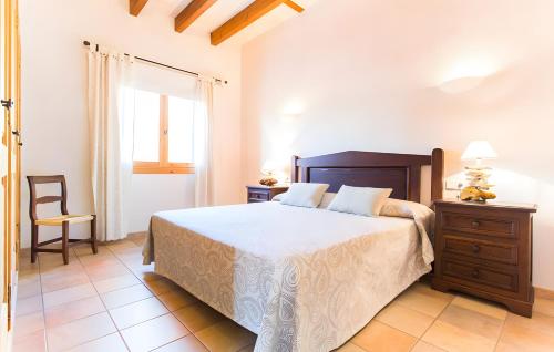 Postel nebo postele na pokoji v ubytování Son Sard Des Padrí Ref 229