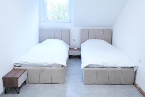 Ένα ή περισσότερα κρεβάτια σε δωμάτιο στο Wohnung IB - Gemütliches Designer-Apartment