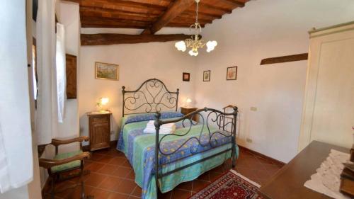 Ένα ή περισσότερα κρεβάτια σε δωμάτιο στο Casuccia di Ama