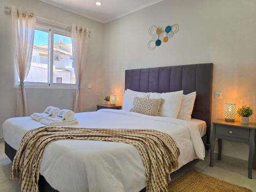 Postel nebo postele na pokoji v ubytování CASA SAFIA - Beach & Center - AC, WiFi