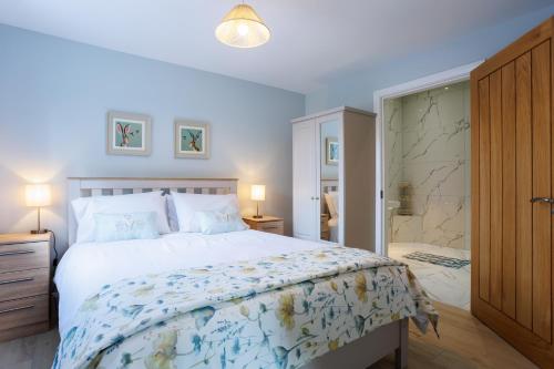 En eller flere senge i et værelse på Whitehill House Farm