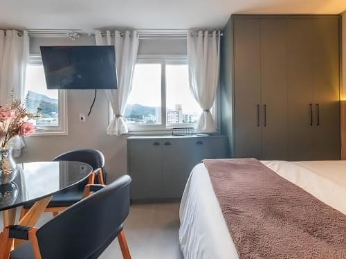 En eller flere senge i et værelse på 1106 - Vila Germânica