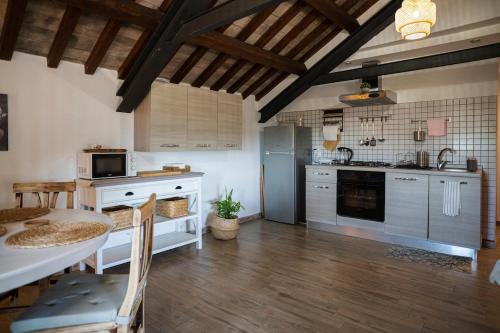 Kuchyň nebo kuchyňský kout v ubytování San Martino Guest House Sunlight