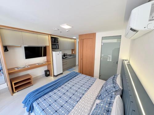 Postel nebo postele na pokoji v ubytování Flat Pé na areia Setai Aquamaris - Jd Oceânia