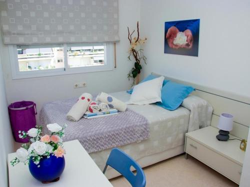 Ένα ή περισσότερα κρεβάτια σε δωμάτιο στο Winahost El balcón al mar de Cubelles